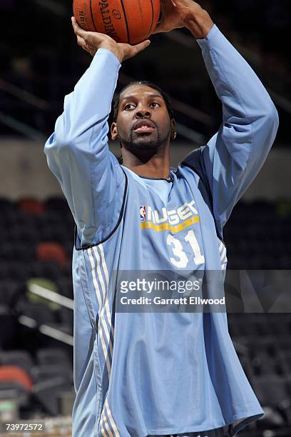 Nene of the Denver Nuggets shoots during practice prior to Game Two against the San Antonio Spurs in the Western Conference Quarterfinals during the...