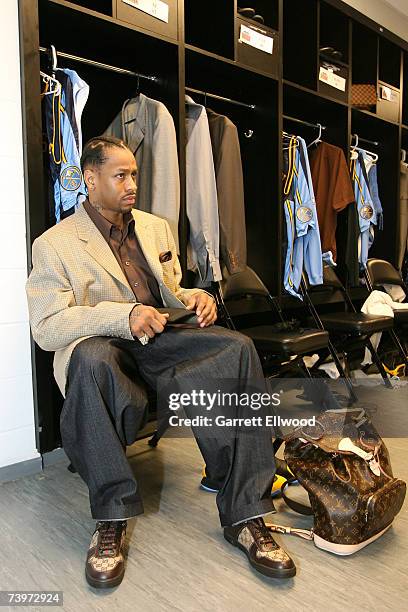 Allen Iverson of the Denver Nuggets sits at his locker prior to the game against the San Antonio Spurs in Game Two of the Western Conference...