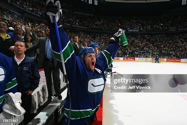 Brendan Morrison of the Vancouver Canucks celebrates at the end of the game against the Dallas Stars during Game 7 of the 2007 Western Conference...