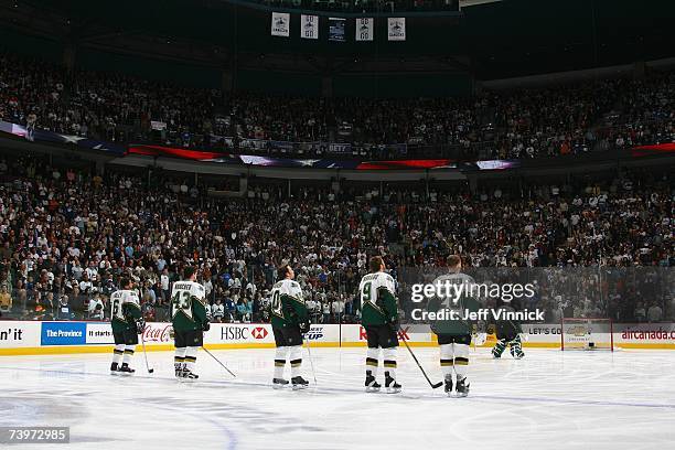 Trevor Daley, Philippe Boucher, Brenden Morrow, Mike Modano, Jere Lehtinen and Marty Turco of the Dallas Stars stand for the National Anthem before...