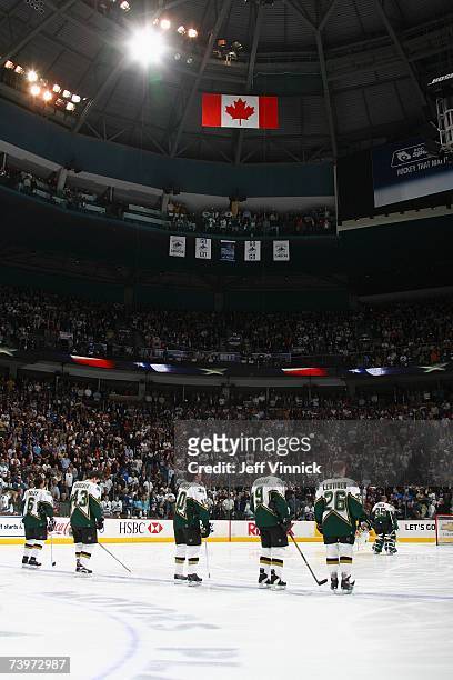 Trevor Daley, Philippe Boucher, Brenden Morrow, Mike Modano, Jere Lehtinen and Marty Turco of the Dallas Stars stand for the National Anthem before...