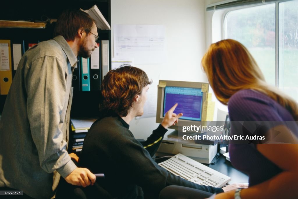 Working Together Background Computer Colleagues Working At Computer Together High-Res Stock Photo - Getty Images