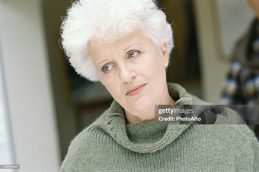 Senior woman, looking away, portrait