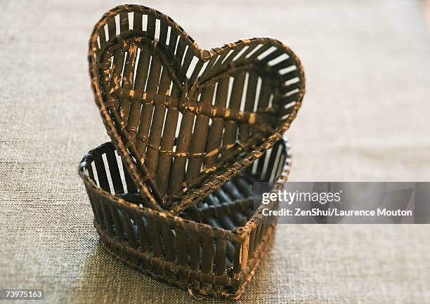 heart-shaped baskets - wicker heart stock pictures, royalty-free photos & images