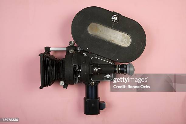 old fashioned movie camera - movie camera stock-fotos und bilder