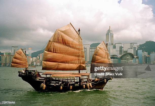 junk ship in victoria harbor, hong kong, china - junk ship stock pictures, royalty-free photos & images