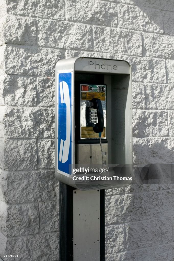 Pay phone on a wall