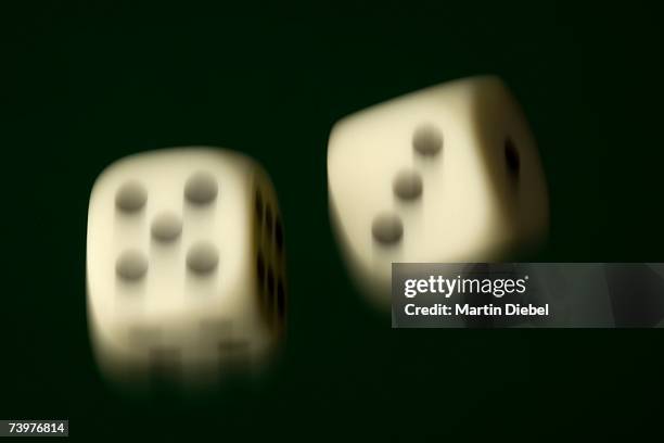 two dice in mid-air - dice pair stock-fotos und bilder