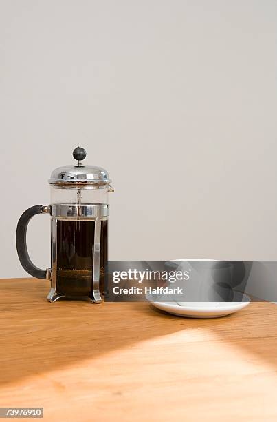 a cafetiere and coffee cup - coffee plunger stock pictures, royalty-free photos & images