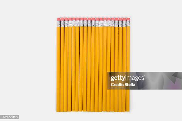 a row of pencils - yellow pencil stock pictures, royalty-free photos & images