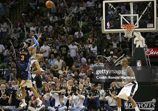 Guard Allen Iverson of the Denver Nuggets takes a shot against Tony Parker of the San Antonio Spurs in Game Two of the Western Conference...