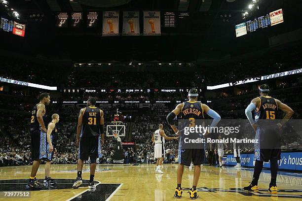 Marucs Camby, Steve Blake, Nene, Allen Iverson and Carmelo Anthony of the Denver Nuggets wait for the San Antonio Spurs in Game Two of the Western...