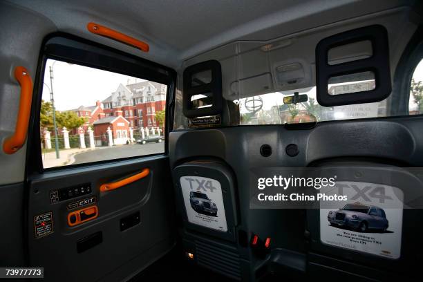 The inner view of a London taxi "Black Cab" TX4 produced by UK manufacturer Manganese Bronze Holdings, at the English style property project Thames...