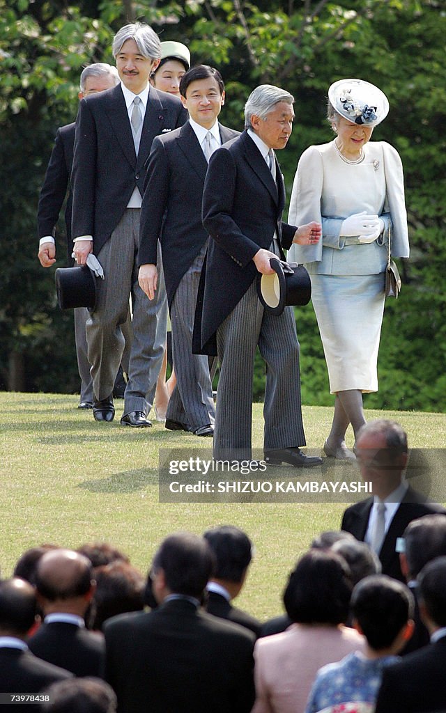 Emperor Akihito, (2nd R), and Empress Mi...