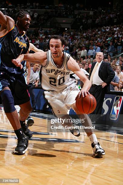 Manu Ginobili of the San Antonio Spurs goes to the basket against Nene of the Denver Nuggets in Game Two of the Western Conference Quarterfinals...