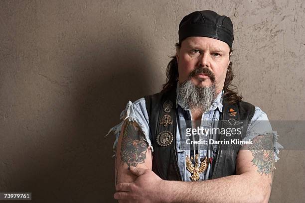 male biker with tattoos on arms, portrait - stereotypical stock pictures, royalty-free photos & images