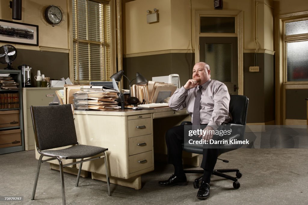 Man sitting at desk in office