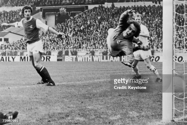 Arsenal goalkeeper Geoff Barnett tries in vain to save Alan Clarke's header during the F A Cup Final between Arsenal and Leeds at Wembley, 6th May...