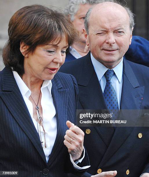 Former French minister Jacques Toubon and wife Lise leave after a funeral mass for French actor Jean-Pierre Cassel at Saint-Eustache's church, 26...