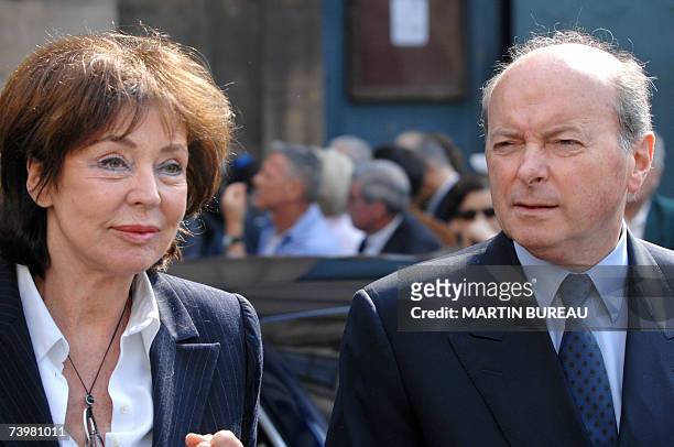 French former minister Jacques Toubon and wife Lise leave after a funeral mass for French actor Jean-Pierre Cassel at Saint-Eustache's church, 26...