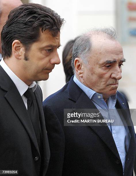 French comedian Laurent Gerra and actor Claude Brasseur arrive at Saint-Eustache's church to attend the funeral mass of French actor Jean-Pierre...