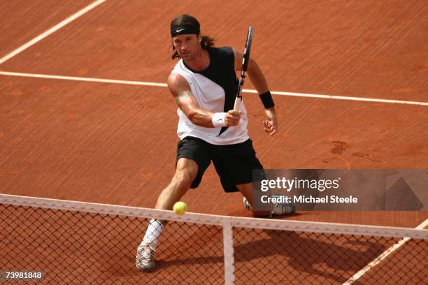 Carlos Moya of Spain during in action his match against David Nalbandian of Argentina on Day Four of the Open Seat 2007 at the Real Club de Tennis,...