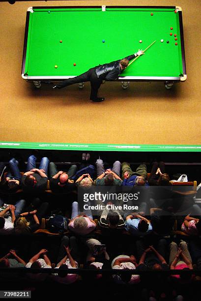 Shaun Murphy of England in action during his first round match against John Parrott of England, in the 888.com World Championship at the Crucible...