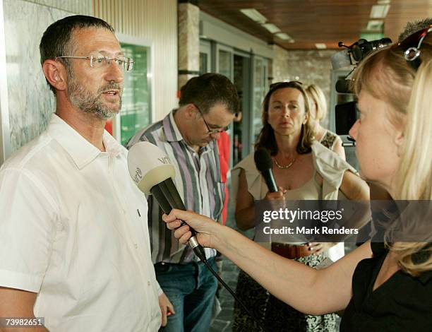 Paul Marchal father of An Marshall who was murdered by convicted paedophile Marc Dutroux, talks to reporters before confronting Dutroux's ex-wife...