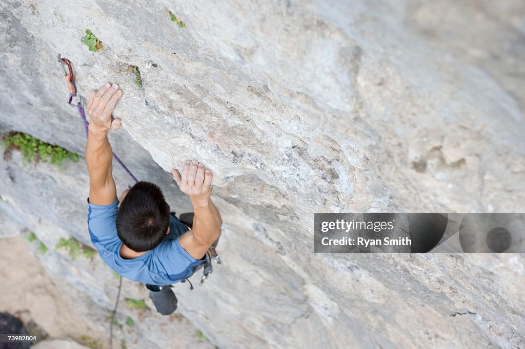 Man rock climbing