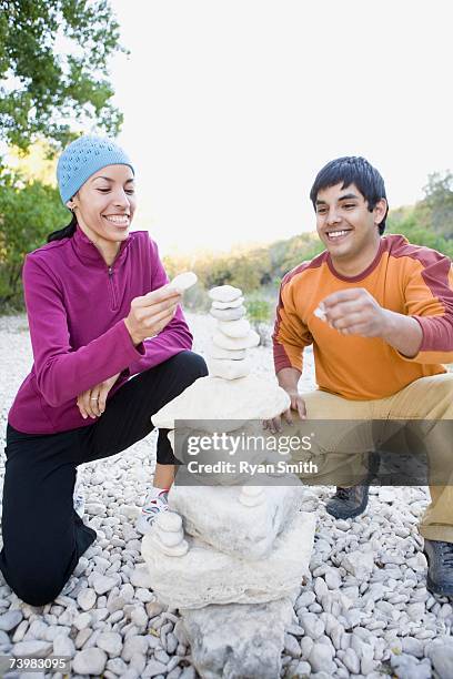 Man Stacking Rocks Man Stacking Rocks Photos and Premium High Res Pictures - Getty Images