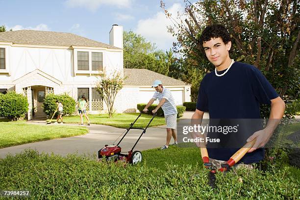 family doing yard work - dad mowing stock pictures, royalty-free photos & images