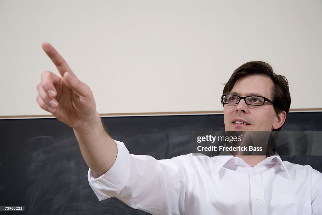 Lecturer pointing