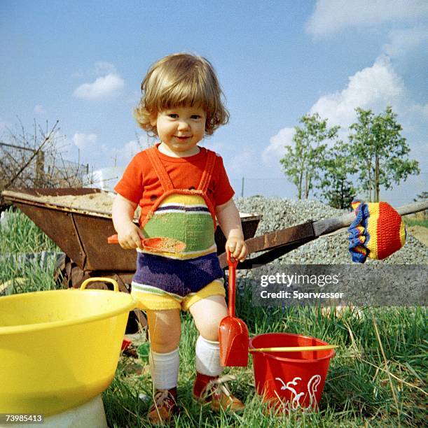 girl playing in garden - memorial garden stock pictures, royalty-free photos & images