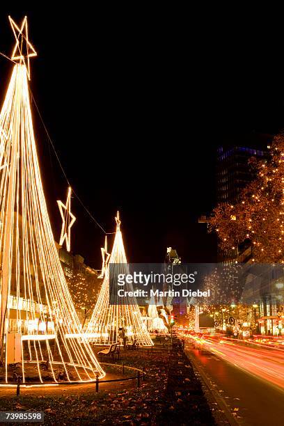 christmas decorations along kurfurstendamm, berlin, germany - boulevard der stars berlin stockfoto's en -beelden
