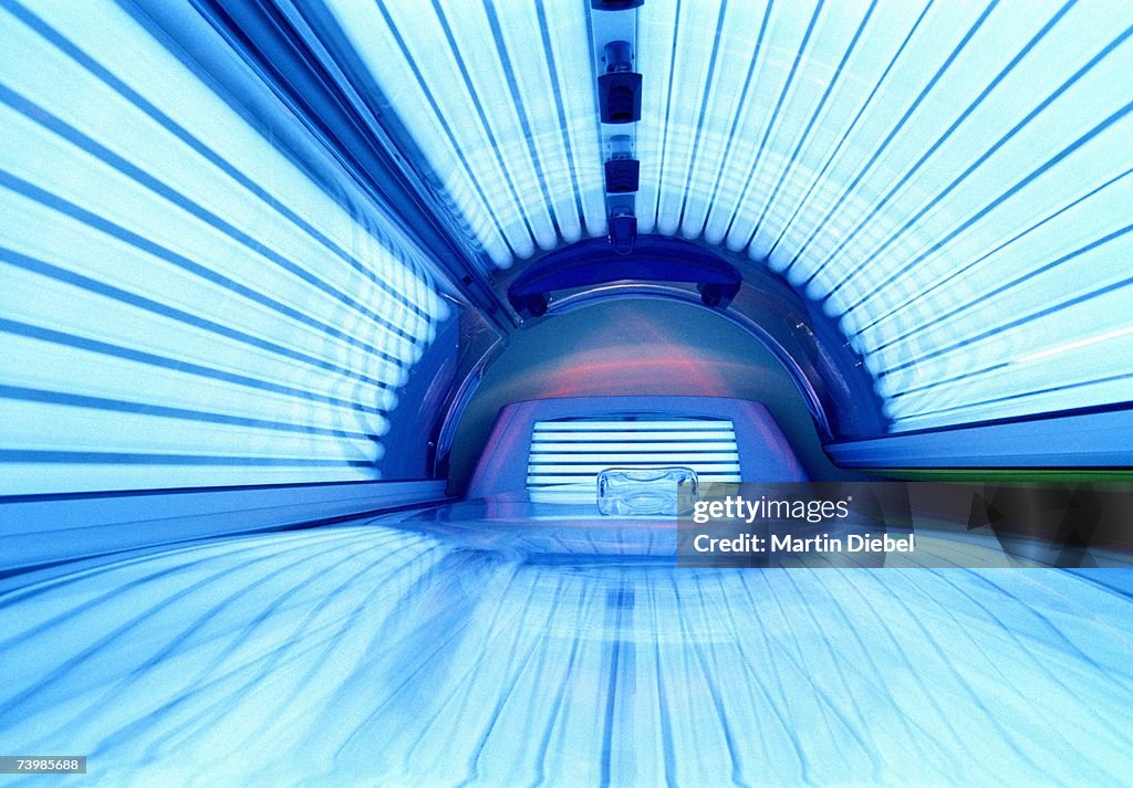 Illuminated tanning bed