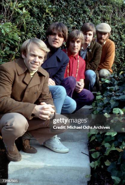 Rock and roll band "The Beach Boys" pose for a portrait kneeling down on some steps in circa 1966. Al Jardine, Bruce Johnston, Dennis Wilson, Carl...