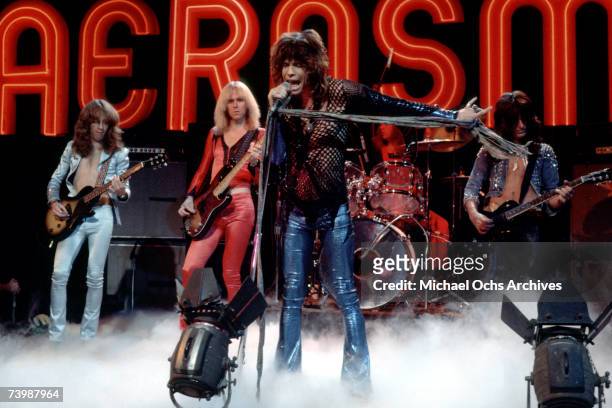 Rock and roll band "Aerosmith" perform on the Midnight Special TV Show on November 24, 1978 in Los Angeles, California. L-R: Brad Whitford, Tom...
