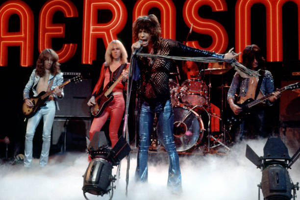 Rock and roll band "Aerosmith" perform on the Midnight Special TV Show on November 24, 1978 in Los Angeles, California. L-R: Brad Whitford, Tom...