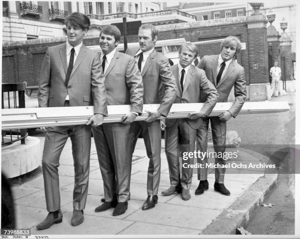 Rock and roll band "The Beach Boys" poses for a portrait on November 2, 1964 in London, England. Brian Wilson, Carl Wilson, Mike Love, Al Jardine,...
