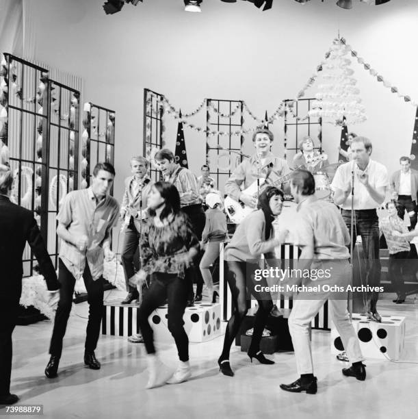 Rock and roll band "The Beach Boys" appears on the Christmas episode of the TV show Shindig! with the Righteous Brothers on December 17, 1964 in Los...