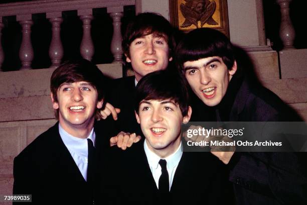 Rock and roll band "The Beatles" pose for a portrait wearing suits in circa 1964. Ringo Starr, John Lennon, Paul McCartney, George Harrison.