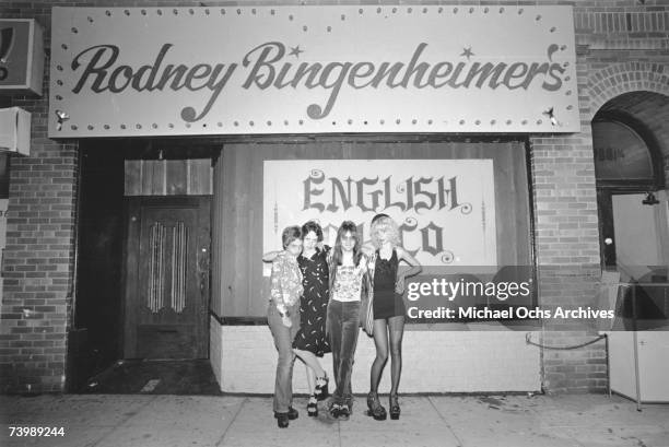 Circa 1974: Photo of Rodney Bingenheimer with Mackenzie Phillips and Sable Starr.