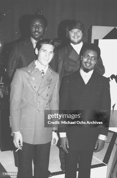 Al Jackson, Steve Cropper, bassist Donald "Duck" Dunn and Booker T. Jones of the R&B band Booker T. & The M.G.'s pose for a portrait backstage during...