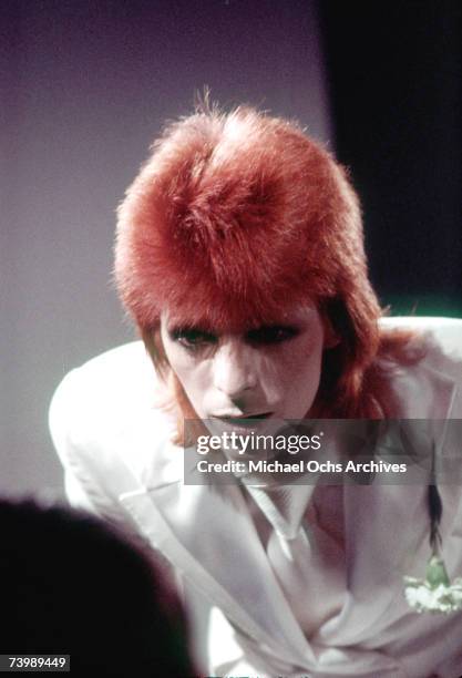 Musician David Bowie performing during his "Ziggy Stardust" era in August 1973.