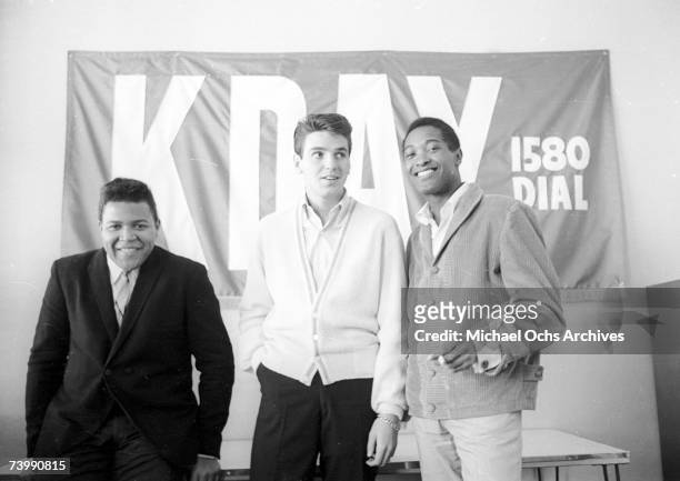 Soul singer Sam Cooke, singer Chubby Checker and KDAY DJ Jack Burns pose for a portrait at the radio station in 1960 in Los Angeles, California.