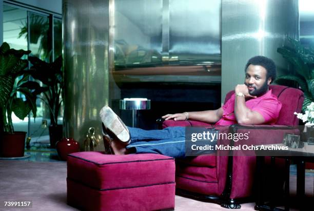 Singer and composer Andrae Crouch poses for a portrait at his home in October 1982.