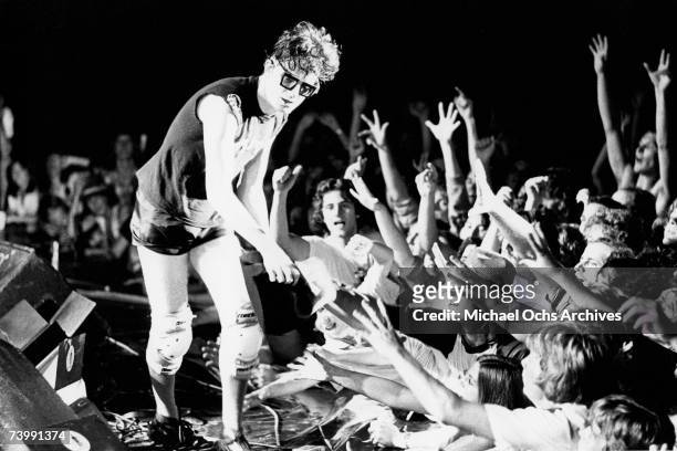 Mark Mothersbaugh of the punk new wave band "Devo" perform onstage in 1982.