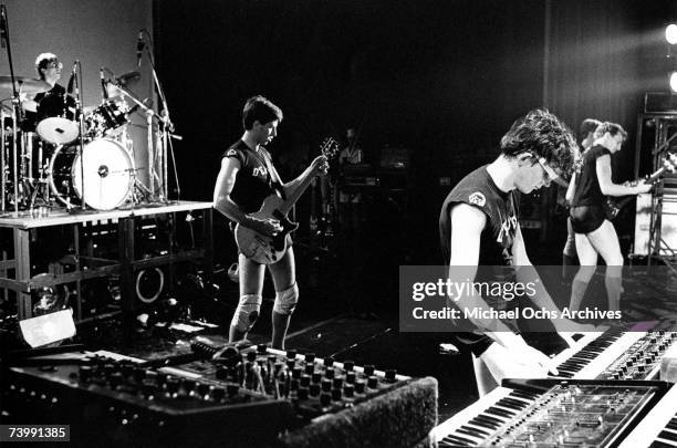 Alan Myers, Bob Mothersbaugh, Mark Mothersbaugh and Gerald Casale of the punk new wave band "Devo" perform onstage in 1982.