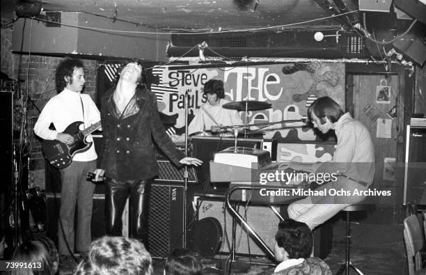 Guitarist Robby Krieger, singer Jim Morrison, drummer John Densmore and keyboardist Ray Manzarek of the rock and roll band "The Doors" perform...