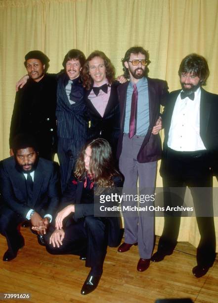 Tiran Porter, Patrick Simmons, Chet McCracken, Keith Knudsen, Michael McDonald, Cornelius Bumpus, and John McFee of the rock and roll band "The...